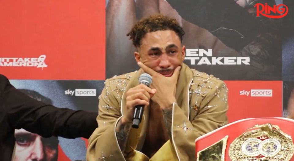 Ben Whittaker crying at a press conference after winning a boxing match.