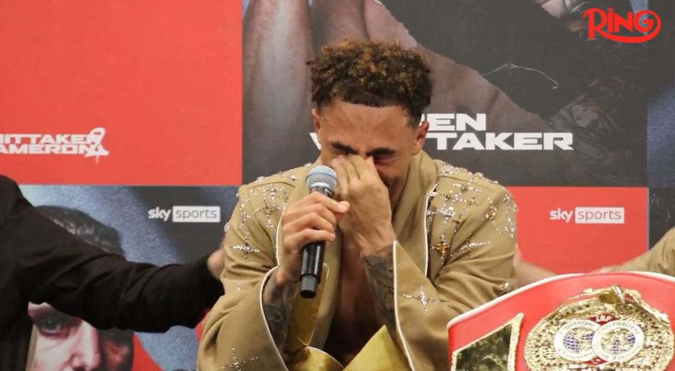 Ben Whittaker crying at a press conference after winning a boxing match.