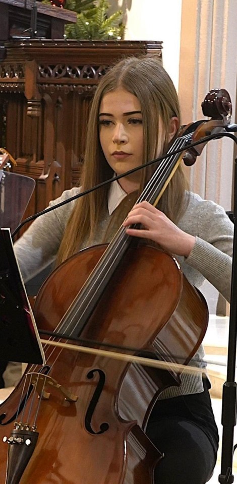 Girl playing cello.