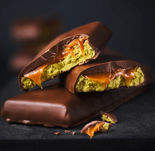 Chocolate bars with caramel and a green filling.