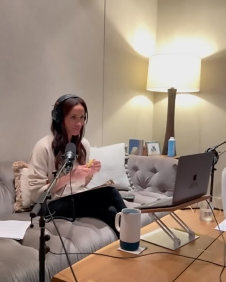 Meghan Markle recording a podcast.
