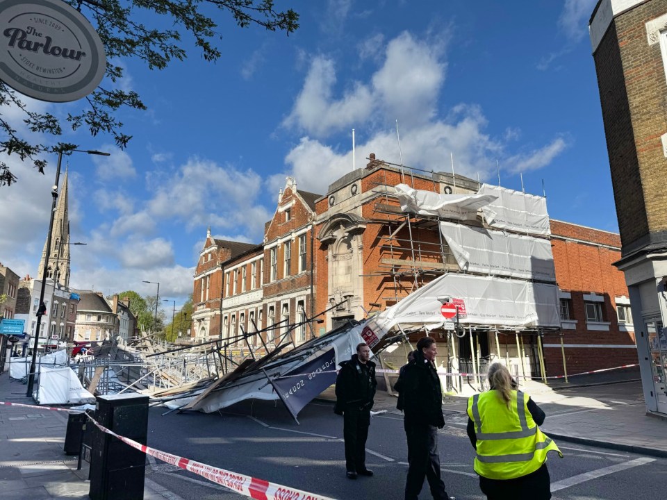 pic shows: High winds London 16.4.25 Scaffolding structure collapsed on Stoke Newington High street this morning hree layers of wood and metal crashed to the ground on Stoke Newington Church Street at around 6.25am. According to bystander, a parked car was hit with someone in it. But the driver of a black walked out unscathed Picture by Simon Wilkinson/ Pixel8000