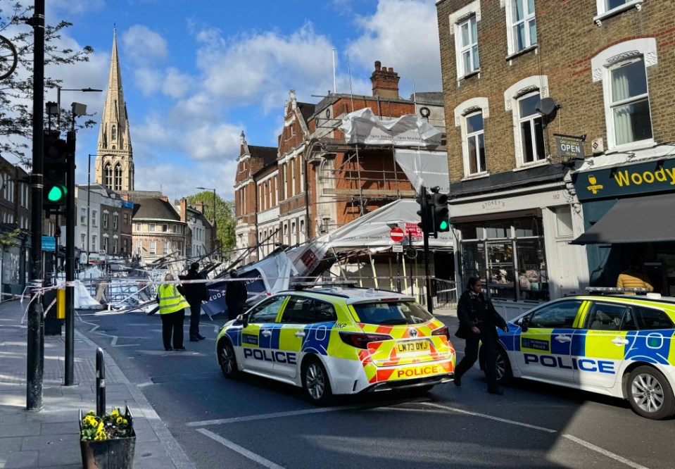 pic shows: High winds London 16.4.25 Scaffolding structure collapsed on Stoke Newington High street this morning hree layers of wood and metal crashed to the ground on Stoke Newington Church Street at around 6.25am. According to bystander, a parked car was hit with someone in it. But the driver of a black walked out unscathed Picture by Simon Wilkinson/ Pixel8000