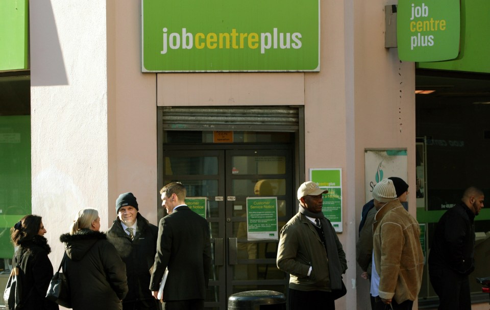 People queueing outside a Job Centre Plus.