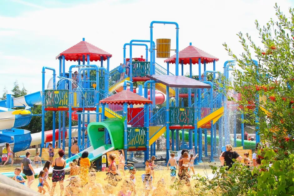 Children playing in a water park.