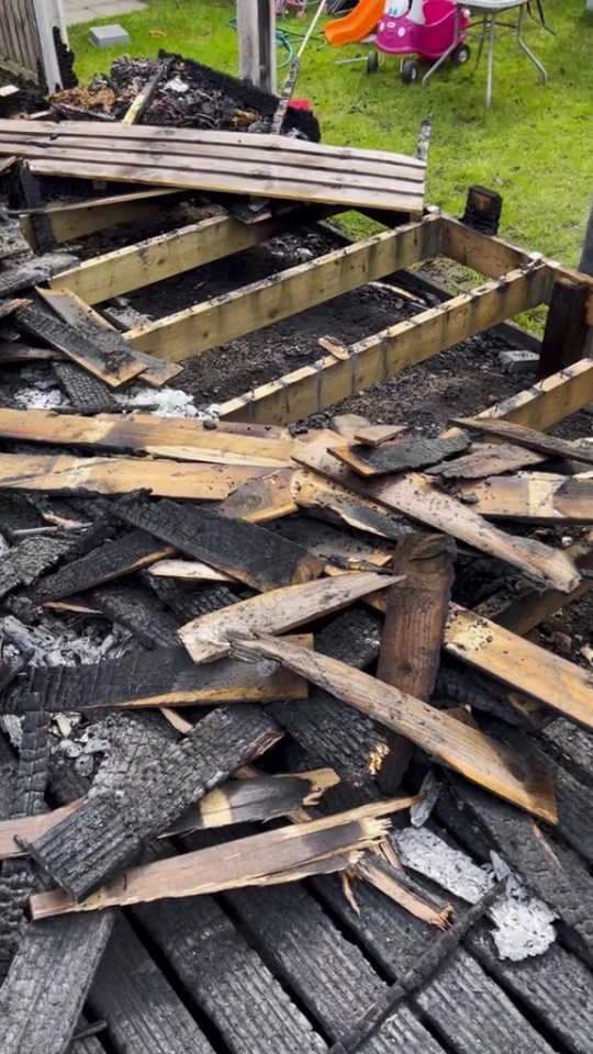 Burned wooden deck remnants.