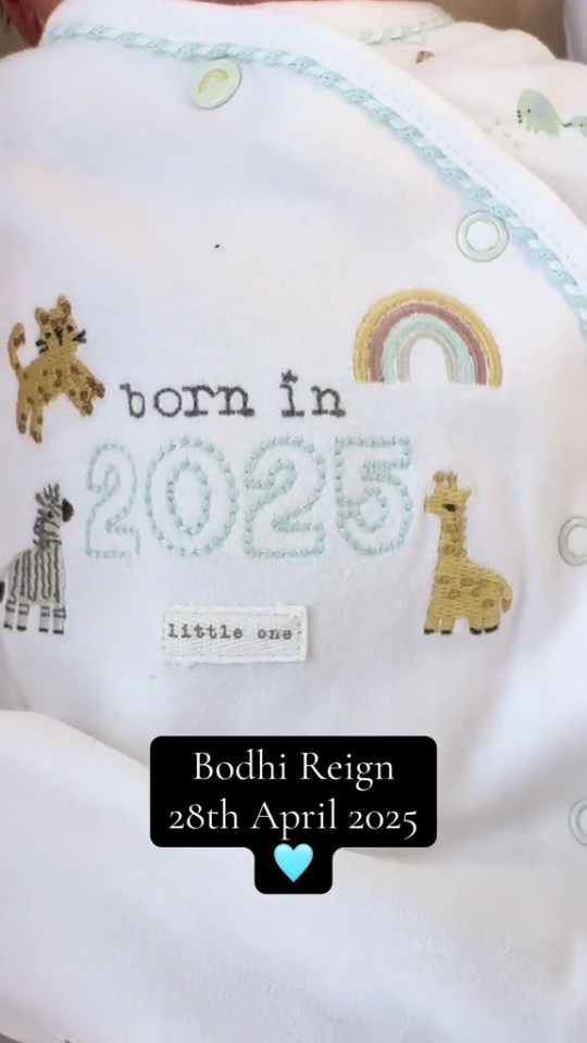 Baby Bodhi Reign's embroidered baby blanket announcing his birth in 2025.