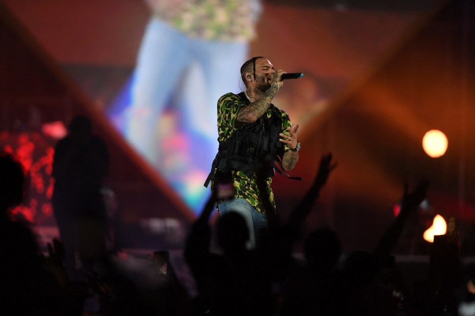 Chris Brown performing on stage.