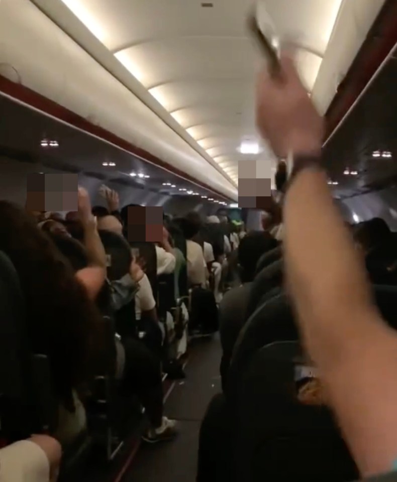 Video of rowdy passengers on an easyJet flight.