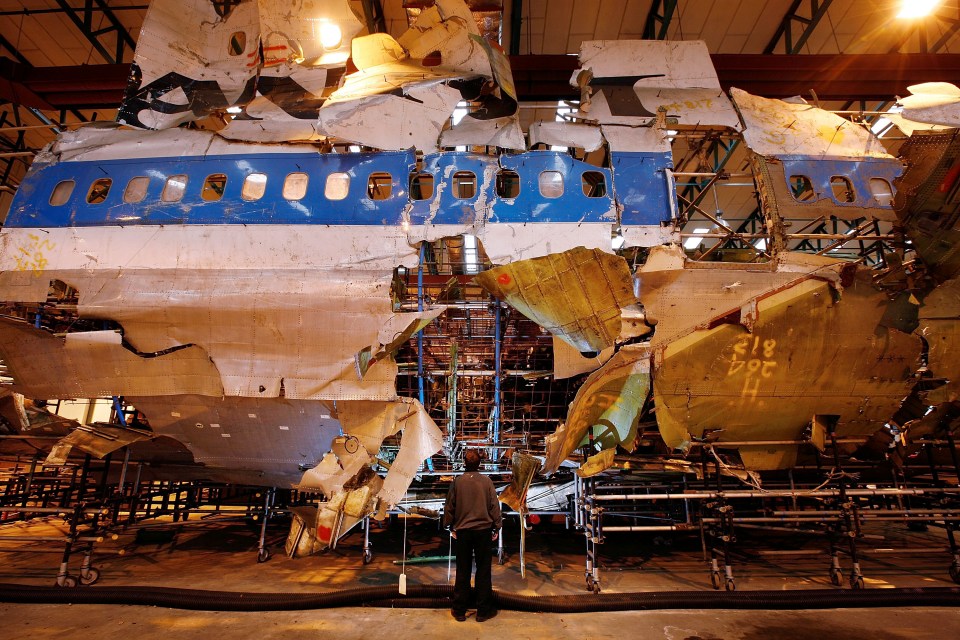 The wreckage of Pan Am Flight 103 in a warehouse.