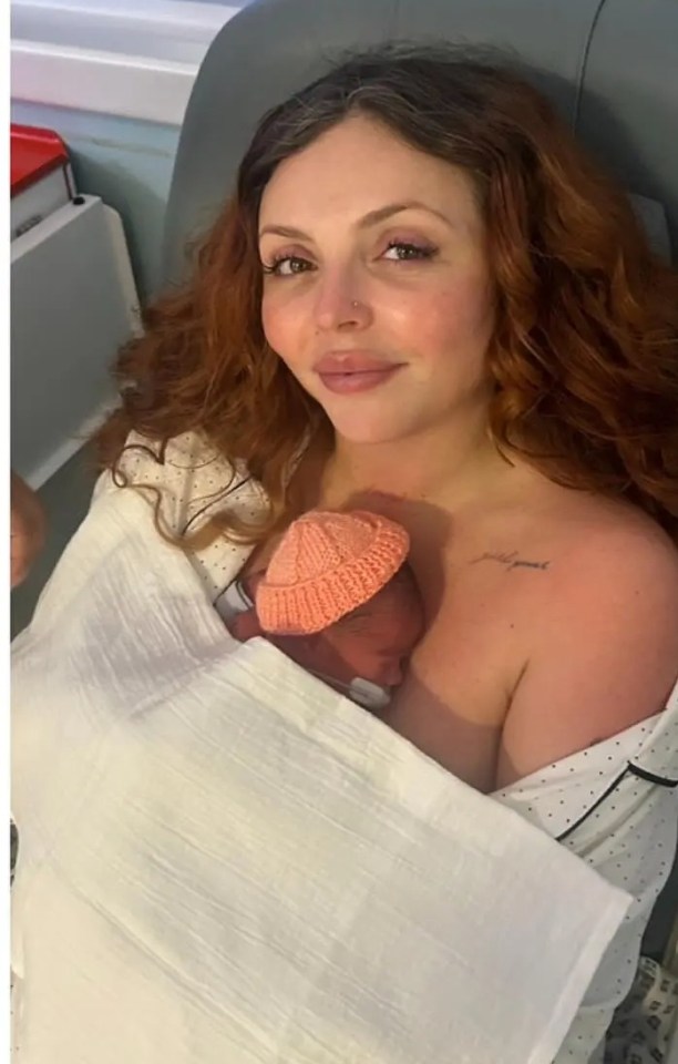 Two parents holding their newborn babies in a hospital.