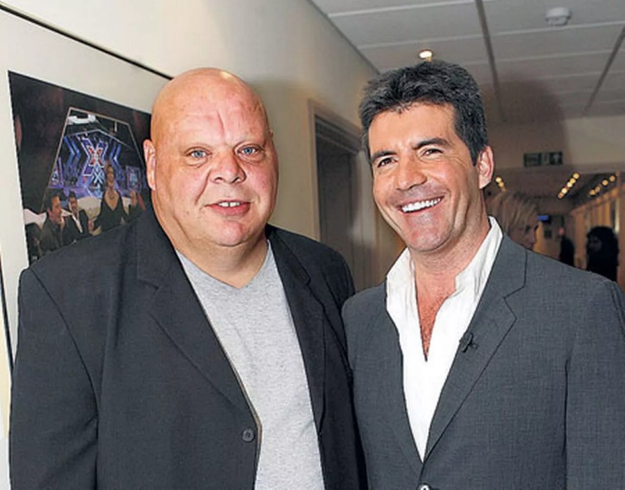 Simon Cowell with Tony Adkins his bodyguard</p>
<p>http://x.com/REALTONYADKINS