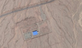 Aerial view of a desert compound.