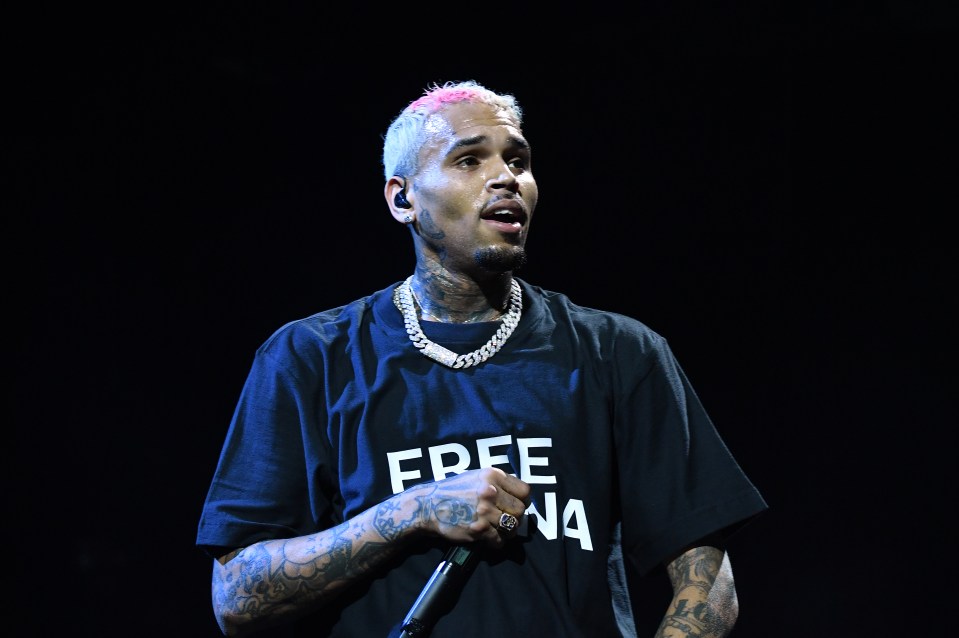 Chris Brown performing onstage.