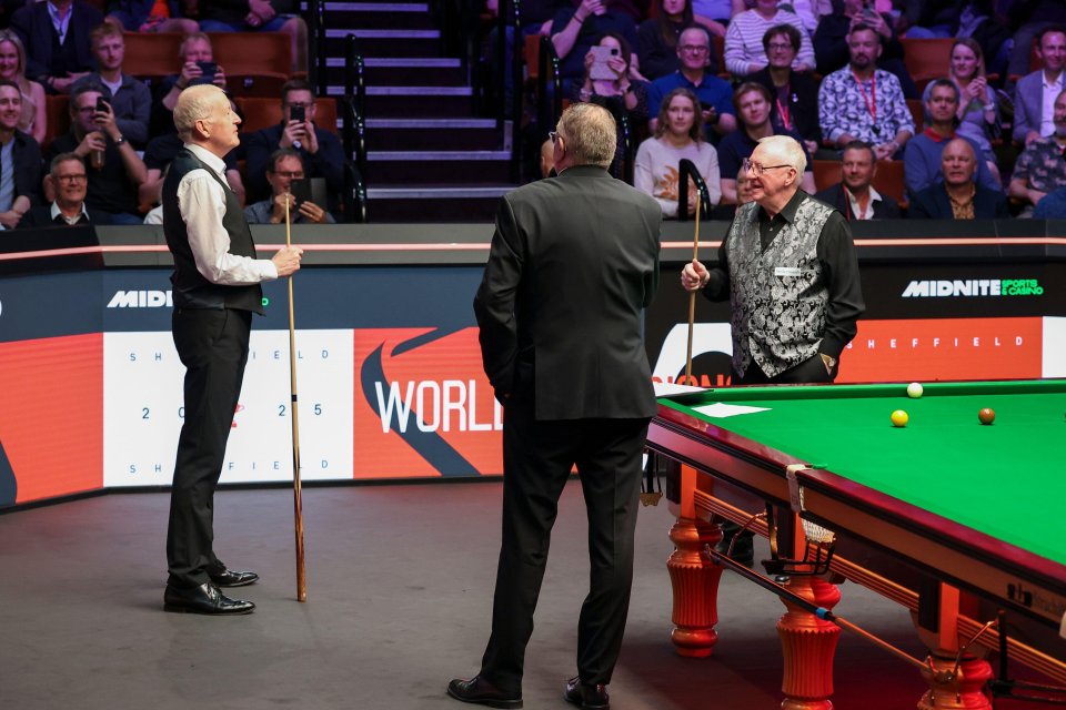 Steve Davis and Dennis Taylor at a snooker exhibition.