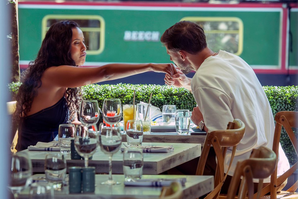 Maya Jama and Ruben Dias on a date at a restaurant.