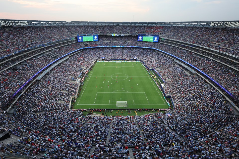 Aerial view of a crowded stadium during a soccer match.