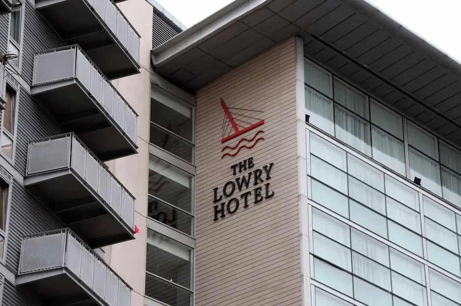 The Lowry Hotel sign on a building.