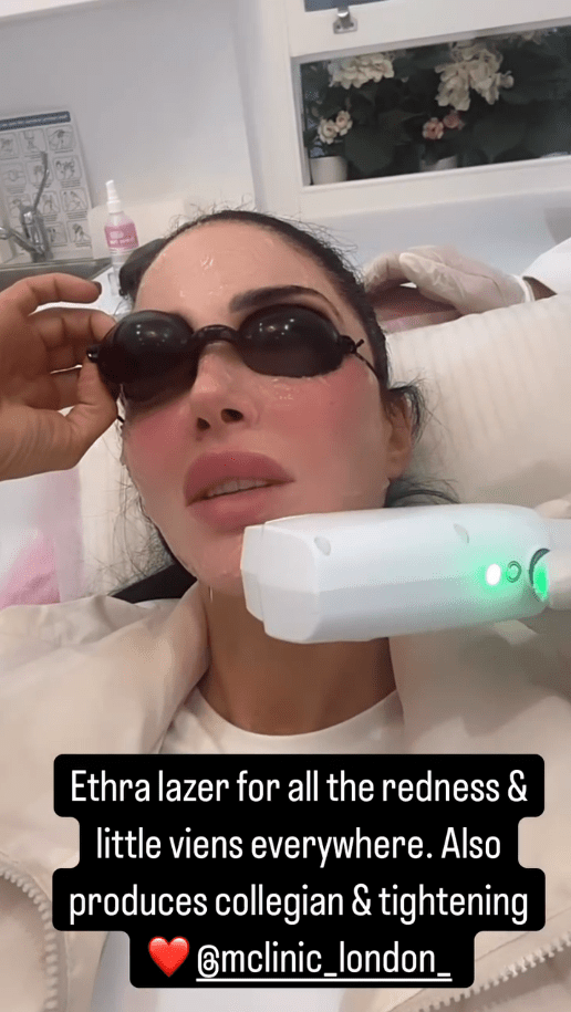 Woman receiving laser treatment.