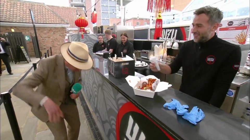 ITV Racing presenter taking a patron's Guinness.