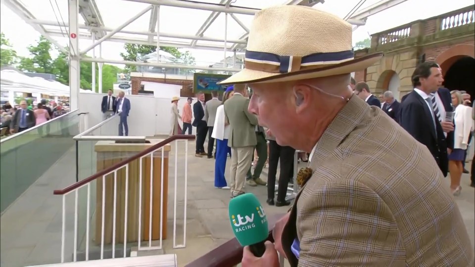 ITV Racing presenter holding a microphone, speaking to the camera.