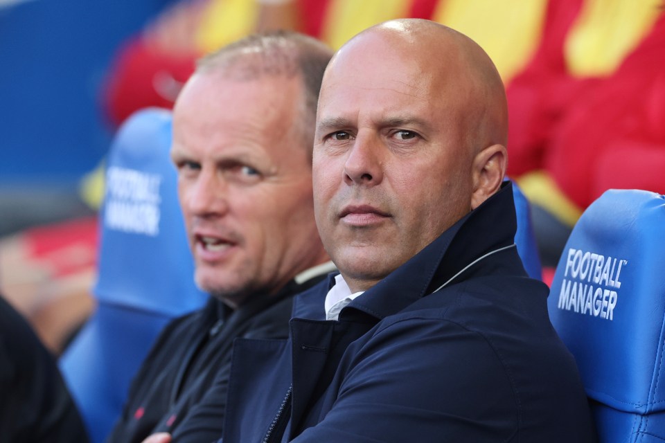 Arne Slot, Liverpool's manager, waits during a soccer match.