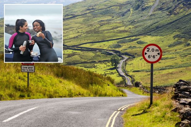 An image collage containing 2 images, Image 1 shows Winding road in the Lake District with road signs indicating steep incline and maximum width, Image 2 shows Two women in wetsuits eating and drinking near their car on a beach