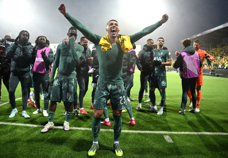 Pedro Porro of Tottenham Hotspur celebrates a victory.