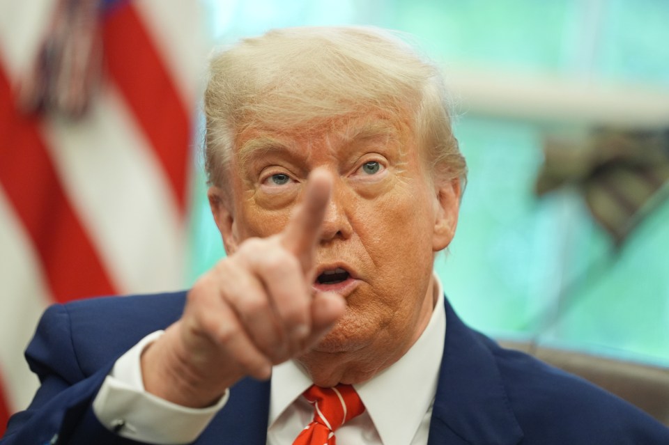 Close-up of Donald Trump gesturing while speaking.