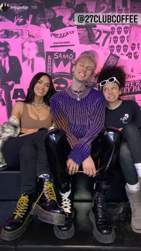 Megan Fox, Machine Gun Kelly, and two friends posing for a photo.