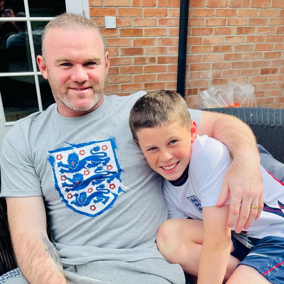 Wayne Rooney and his son Kai celebrating an England victory.