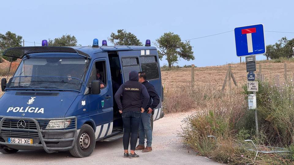 Portuguese police closing a dirt road.