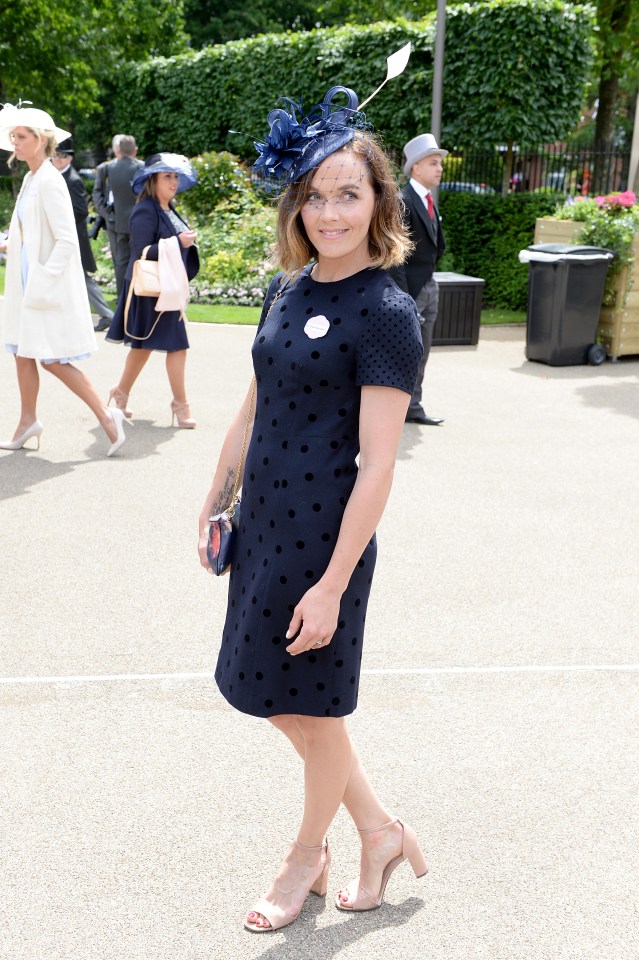 Victoria wore a navy shift dress