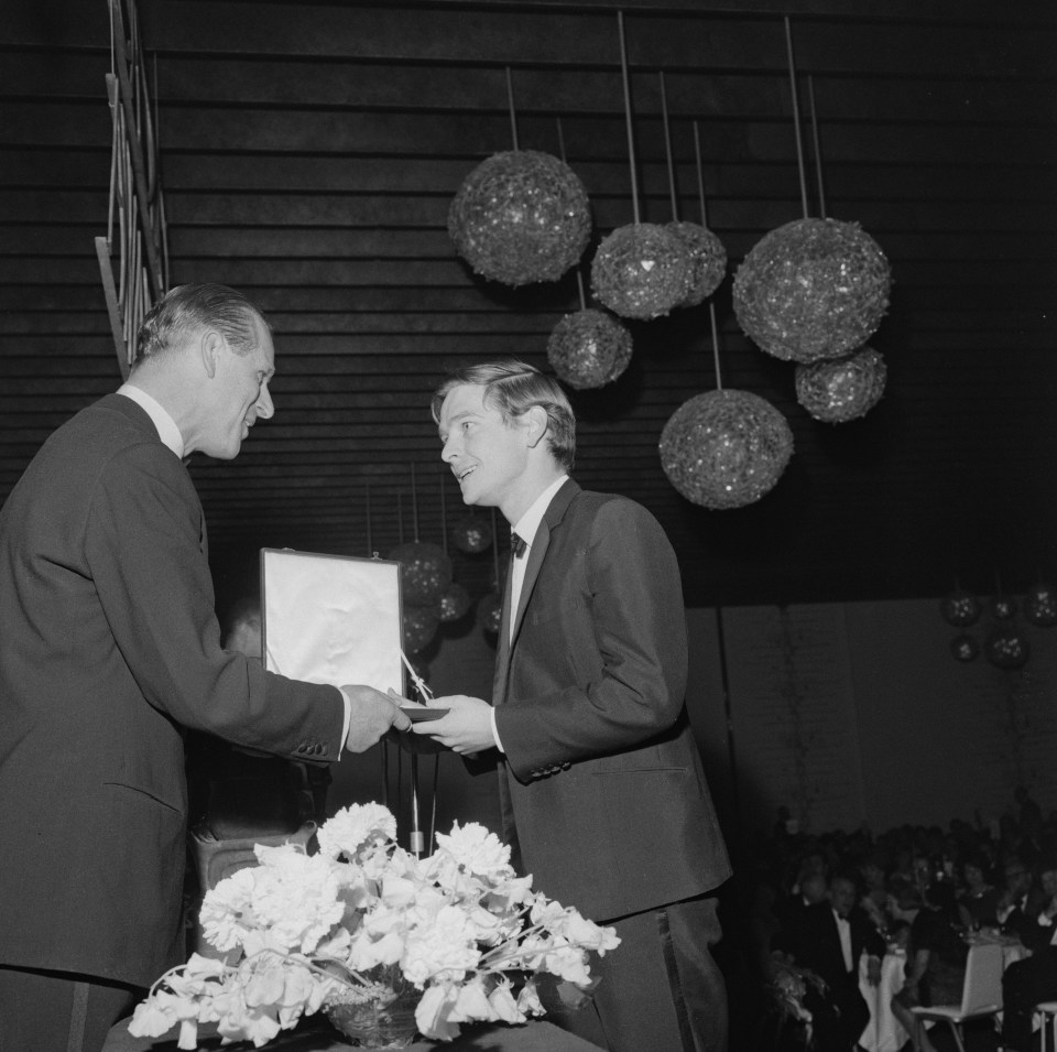 The Duke of Edinburgh presents the Most Promising Newcomer award to English actor Tom Courtenay at the 16th British Academy Film Awards in London on 8th May 1963