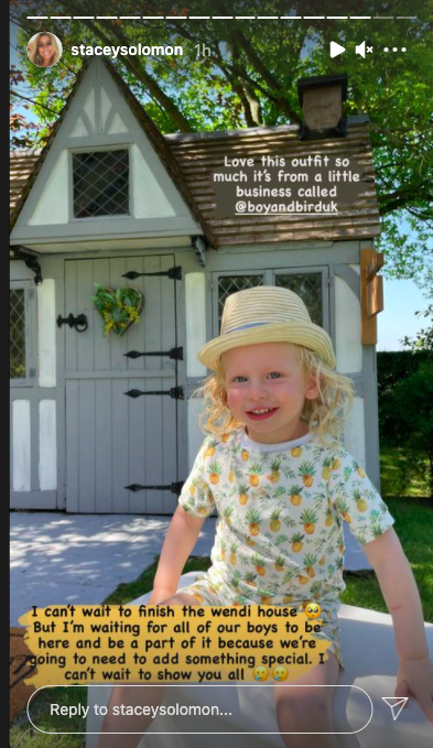 Stacey painted the Wendy House white and silver