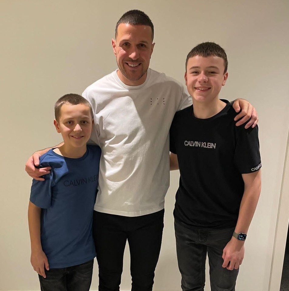 Proud dad Richard Wood with his two boys Graye and Jenson