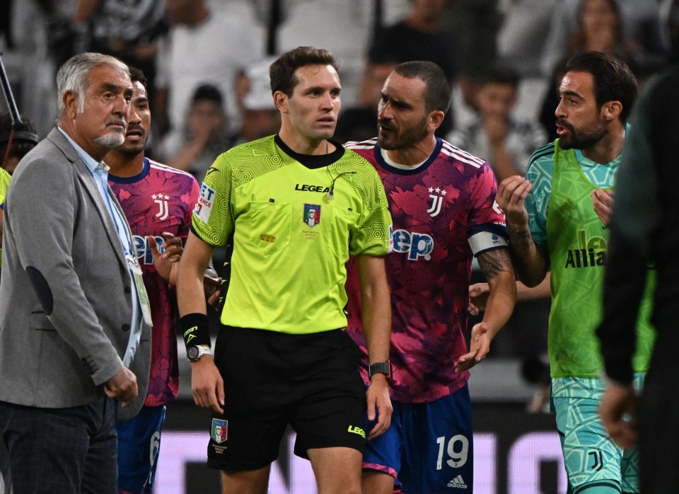 Referee Matteo Marcenaro busily disallows Juve's winner
