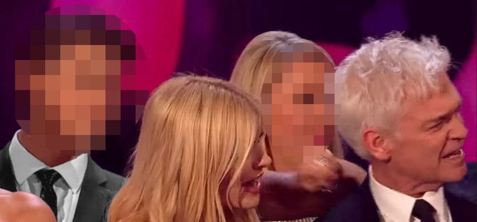 The runner was seen behind Phillip Schofield during the award ceremony