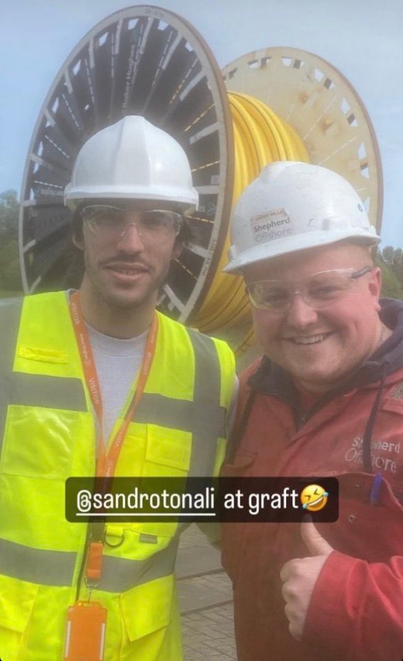 Sandro Tonali was spotted in a hi-vis jacket and helmet