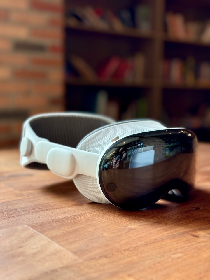 a pair of goggles laying on a wooden table