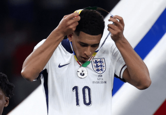 Fans quickly spotted what several England players did after receiving their medals