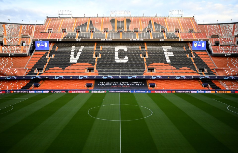an empty soccer stadium with the word vcf on the stands