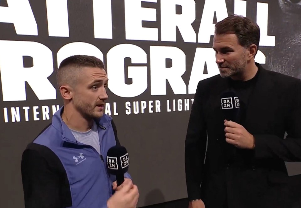 two men are standing in front of a sign that says international super light