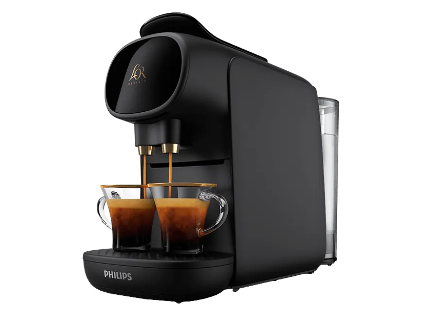 a black philips coffee maker is pouring two cups of coffee