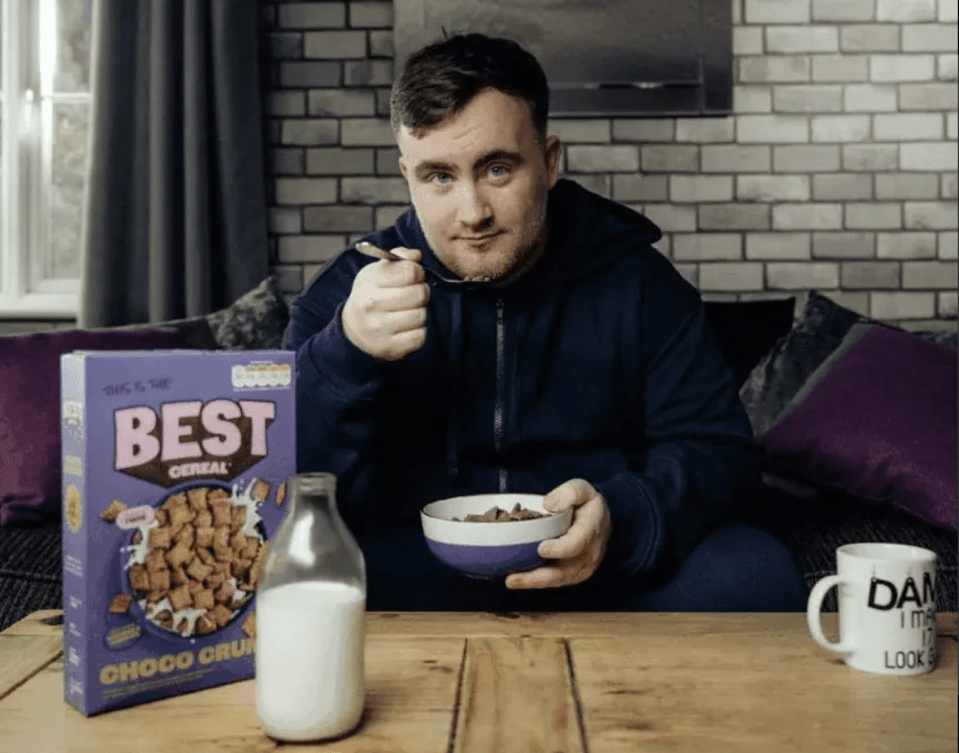 Man eating Chocco Crunch cereal.