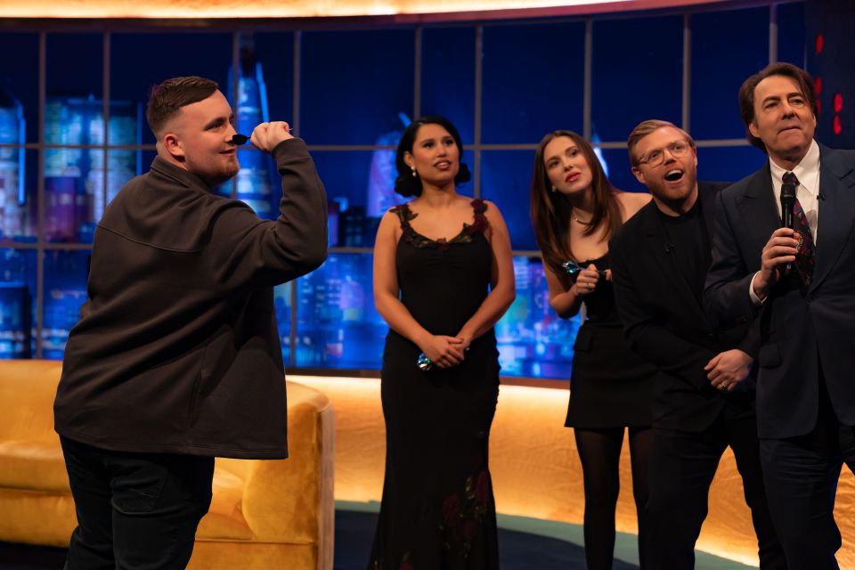 Jonathan Ross, Luke Littler, Raye, and other guests on a television show.
