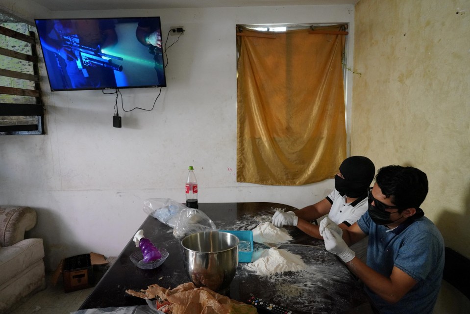 Sinaloa Cartel members preparing methamphetamine capsules.