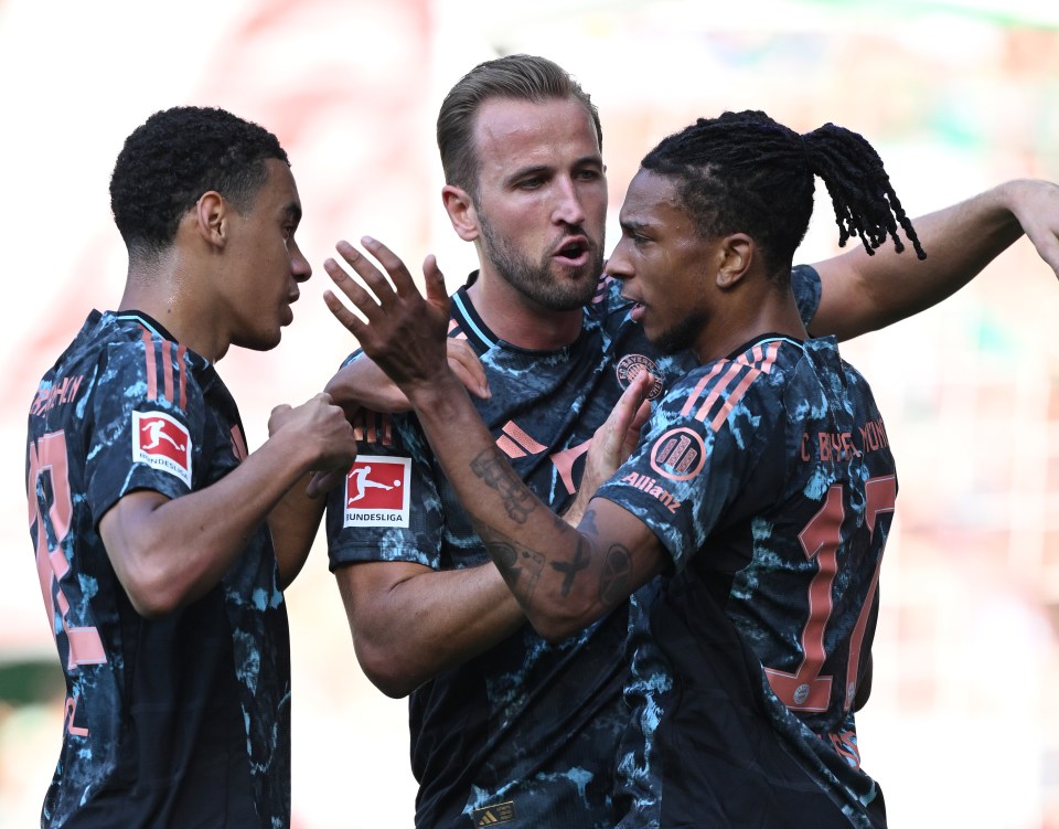 Bayern Munich players celebrating a goal.