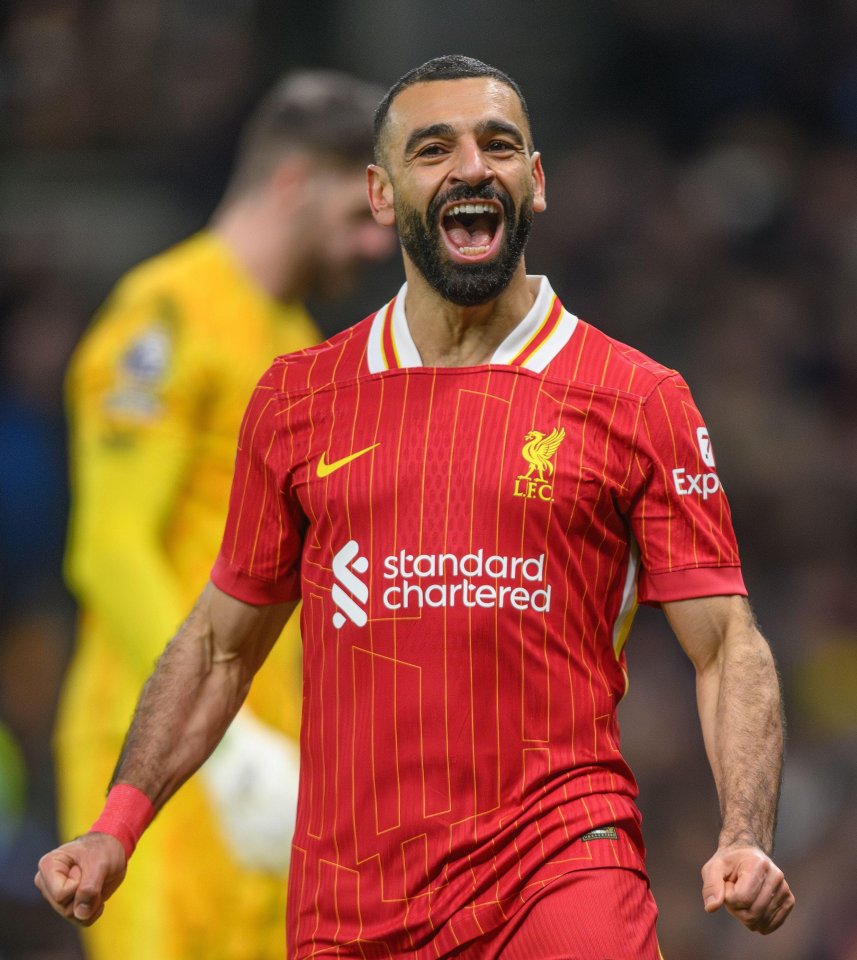 Mo Salah celebrating a goal at Tottenham Hotspur Stadium.