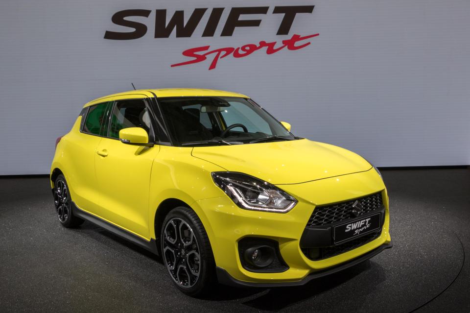 Yellow 2018 Suzuki Swift Sport car.